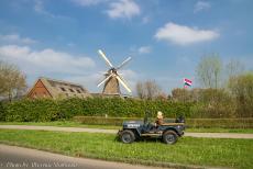 Operation Quick Anger Commemoration 2018 - Operation Quick Anger Commemoration and Memorial Tour 2018: A WWII Ford GPW Jeep in front of windmill the Hope in the Dutch village...