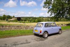 IMM 2019 Bristol - Classic Car Road Trip: Een rit door de Cotswolds in onze classic Mini, op de achtergrond Upper Slaughter Manor. Het landhuis is meestal gesloten...