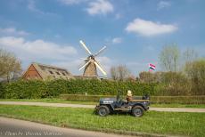 Operation Quick Anger Commemoration 2018 - Operation Quick Anger Commemoration and Memorial Tour 2018: A WWII Ford GPW Jeep in front of windmill the Hope in the Dutch village...