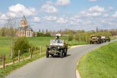 Commemoration Operation Quick Anger 2019 - Operation Quick Anger Commemoration 2019: WWII military vehicles driving on the dyke road at Oud-Zevenaar, in the background the Saint...