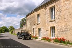 Normandy, 75 years after D-Day - A memorial tour through Normandy during the 75th anniversary of D-Day: Our Ford GPW Jeep in front of a row of traditional French houses in a... Normandy, 75 years after D-Day - A memorial tour through Normandy during the 75th anniversary of D-Day: Our Ford GPW Jeep in front of a row of traditional French houses in a...
