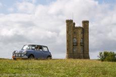 IMM 2019 Bristol - Classic Car Road Trip: The Mini Authi in front of the Broadway Tower, a folly on Broadway Hill in the village of  Broadway. The twenty...