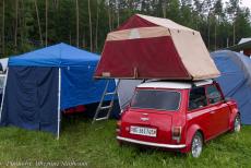 Germany, IMM Geiselwind - IMM Geiselwind, Germany: A rooftop tent on top of a Classic Mini.&nbsp;During the IMM, heavy rain showers passed over the campsite. Due to this...