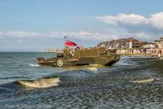 Normandy 2014 - Classic Car Road Trip Normandy during the 70th anniversary of D-Day: A DUKW floating on the sea in front of Juno Beach at Courseulles-sur-Mer. In...