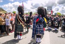 Normandy, 70 years after D-Day - Commemorating D-Day in Normandy: A Scottish pipe and drum band on Pegasus Bridge at Ranville as part of the 70th anniversary commemorations of... Normandy, 70 years after D-Day - Commemorating D-Day in Normandy: A Scottish pipe and drum band on Pegasus Bridge at Ranville as part of the 70th anniversary commemorations of...