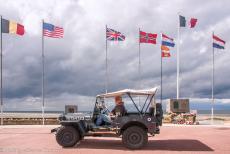 Normandy, 65 years after D-Day - Normandy 2009: Our own RAF-blue Ford Jeep in front of a WWII memorial in Bernières-sur-Mer. The monument was erected in... Normandy, 65 years after D-Day - Normandy 2009: Our own RAF-blue Ford Jeep in front of a WWII memorial in Bernières-sur-Mer. The monument was erected in...